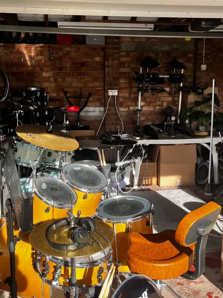 Image of a drum kit in a garage